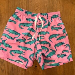 Chubbies Pink Swim Shorts with Green Alligator Design